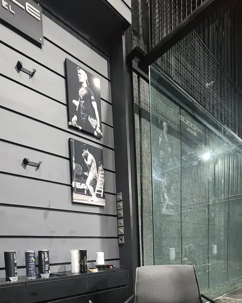 Armchair beside framed photos